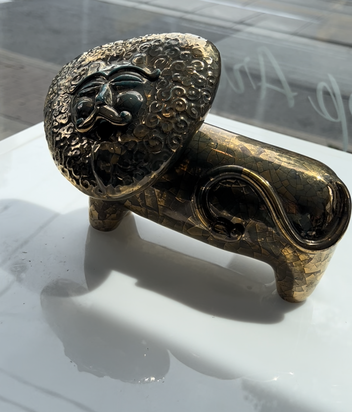 Golden ceramic Lion with triangular head - small