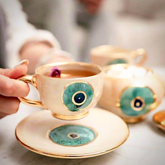 Evil Eye Ceramic cup and saucer Set- With Gold Plated Gold Handle