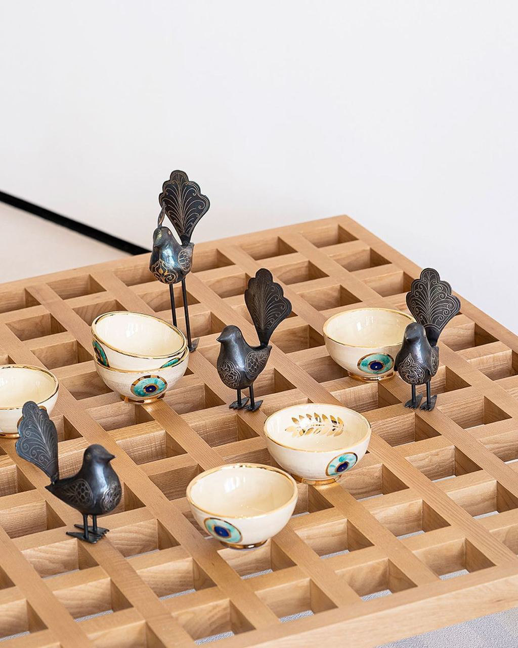 Small Gold/Silver Painted metal bird - crowned high tail